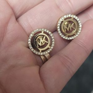 Michael kors studs. One Stone Missing In One Of The Studs